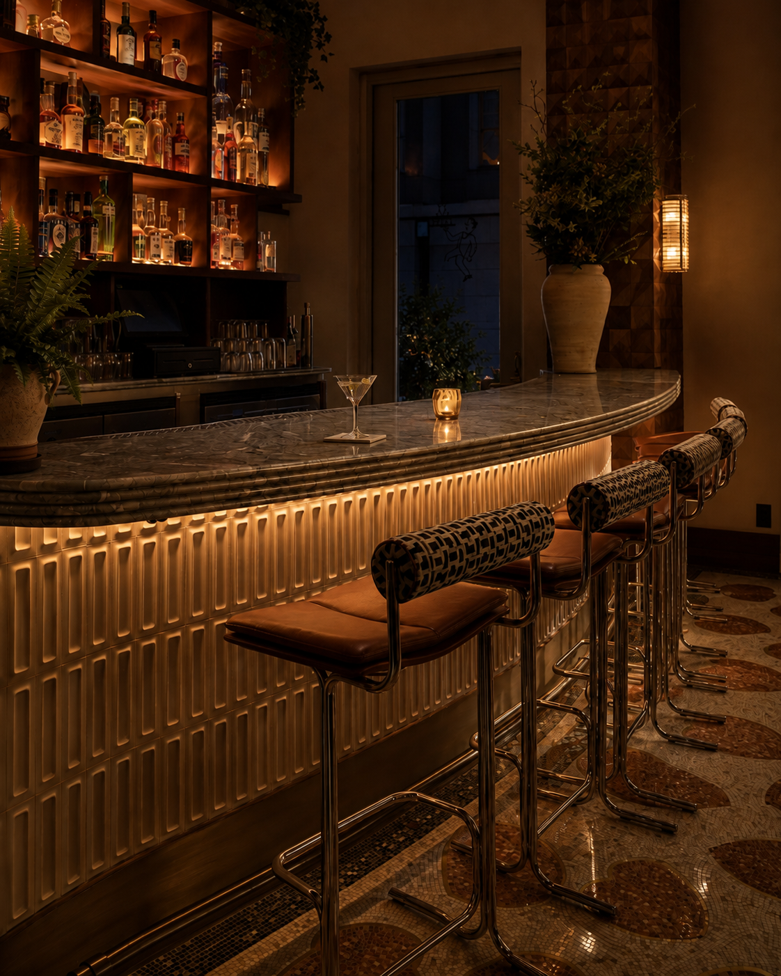 Marble bar counter lit from beneath at night